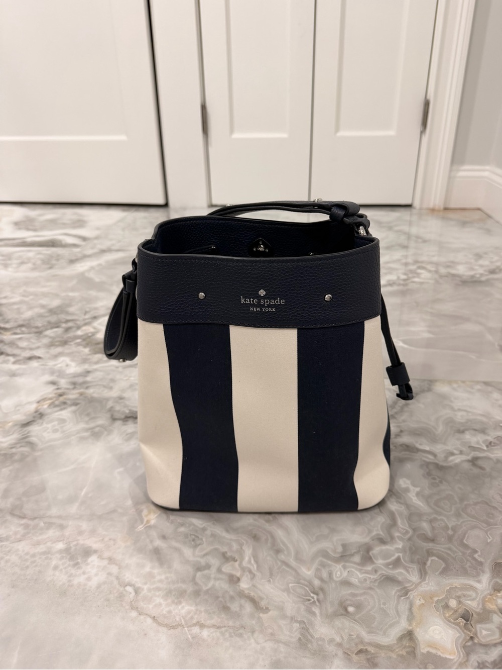 kate spade Navy and Cream Striped Drawstring Bucket Bag